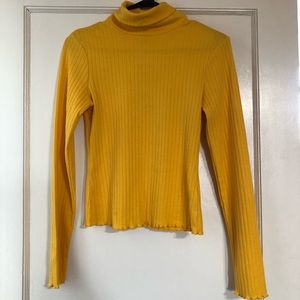 Yellow turtleneck